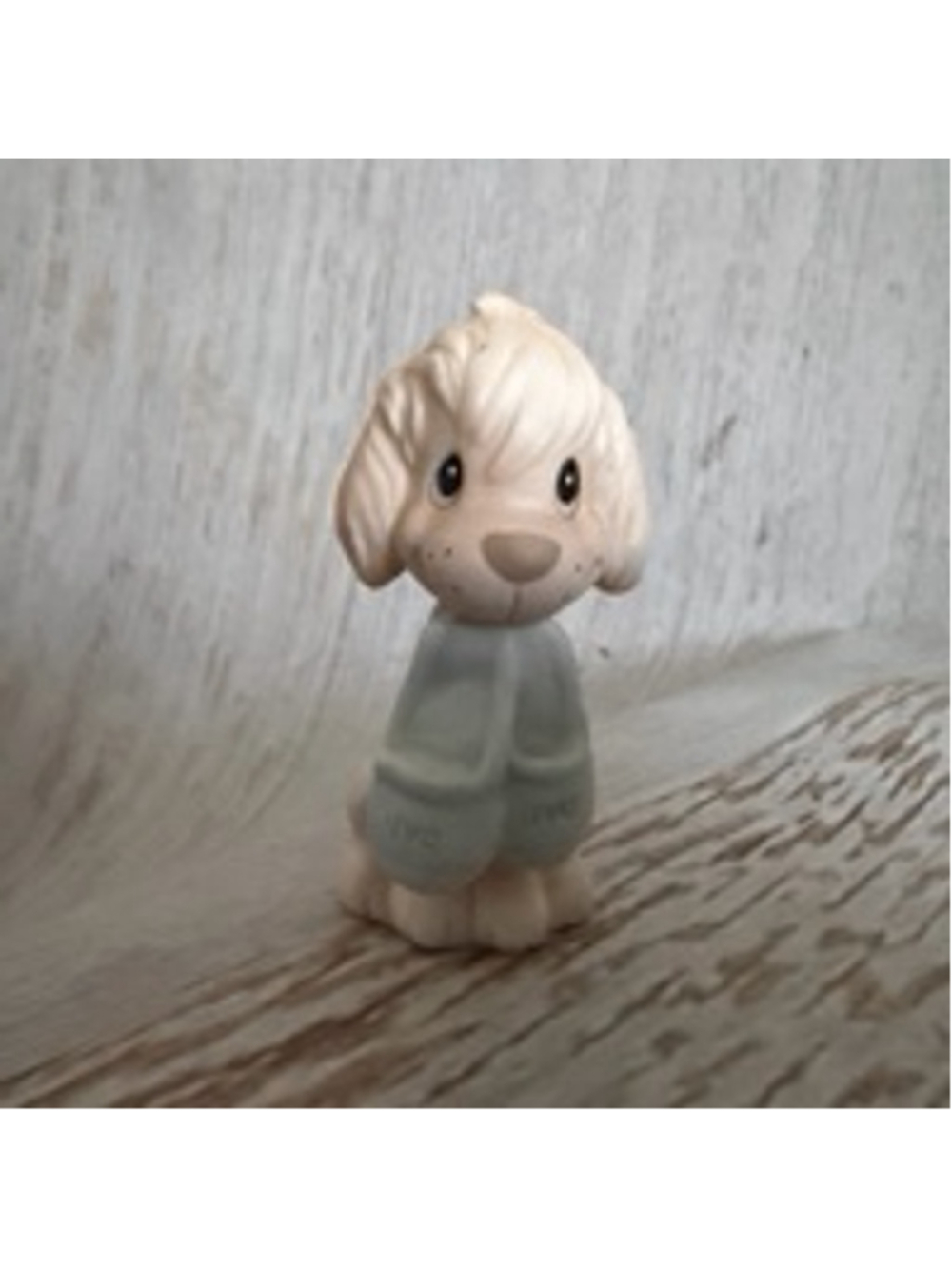 Vintage 1982 Precious Moments figurine titled "Dog With Dads Slippers” Dog Dad